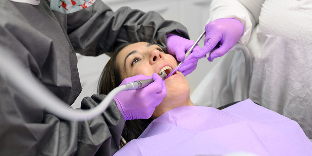 Dental Hygienist with Patient