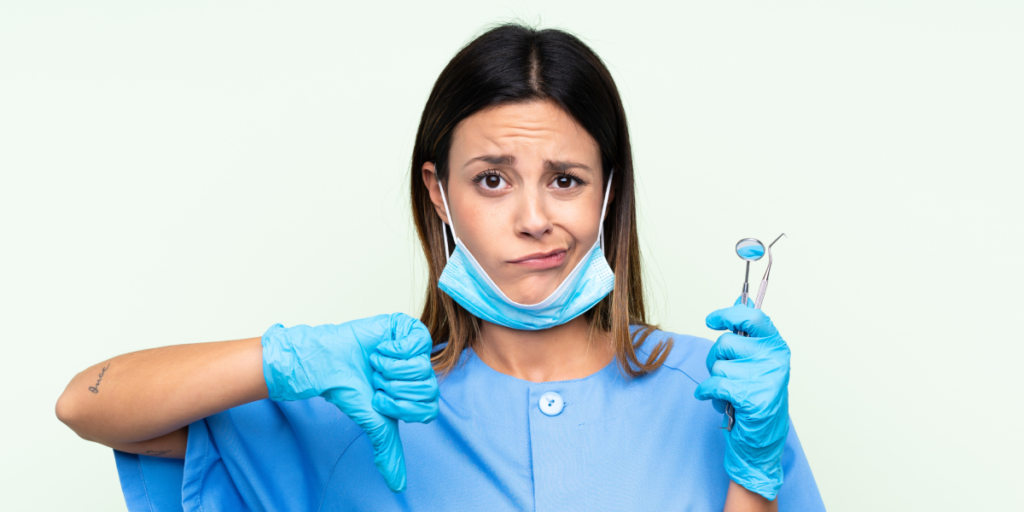 thumbs down dentist