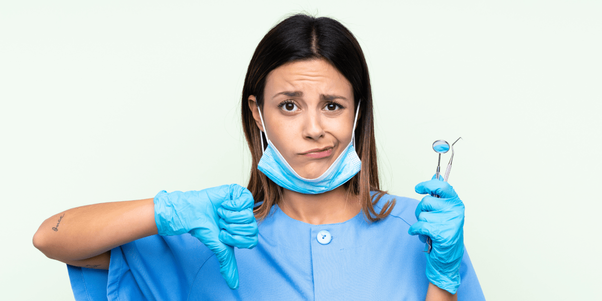 thumbs down dentist